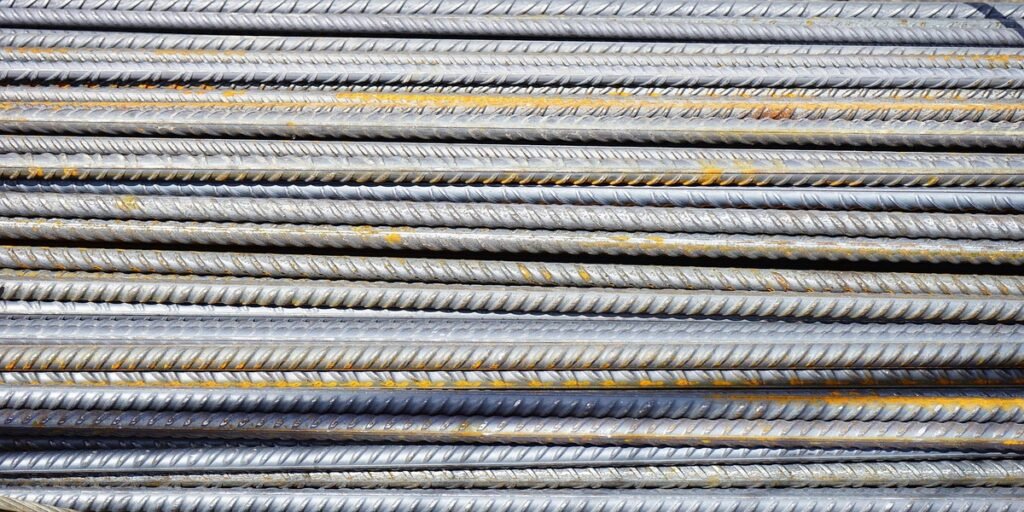 steel coils secured on a flatbed trailer